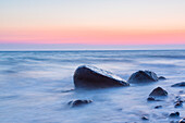  Stones at sunrise on the Brodtener Steilufer on the Baltic Sea, Schleswig-Holstein, Germany 