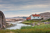  Wooden huts on the Schaerenkueste, Ramsvik, Bohuslaen. Sweden 