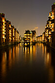  View of the moated castle in the evening, Speicherstadt, Hanseatic City of Hamburg, Germany 