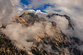  Mountain peaks in the Dolomites with clouds - Italy - South Tyrol 