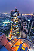  View from the Octave Rooftop Bar to the Tichuca Rooftop Bar on the 46th floor of the T‑One Building.T-One building, Top floor Tichuca Rooftop bar, Bangkok Skyline, View from Octave sky bar, Sukhumvit 40, WeWork coworking Space, Bangkok, Thailand 