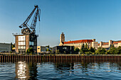  Harbor crane, historic industrial quarter, Peter-Behrens-Bau, Oberschoeneweide, Oberspree, Berlin, Germany 