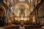 Interior view of the Montserrat monastery's church. Abbey of Santa Maria de Montserrat, Catalonia, Spain.