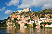 View of Miravet village with Miravet Castle on top of the hill. Miravet, Catalonia, Spain.