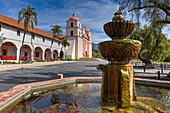 Water fountain in front of the historic Mission Santa Barbara. Santa Barbara, California, USA.