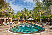 Buildings and the pool area of luxurious Mia Resort Mui Ne. Mui Ne Beach, Binh Thuan Province, Vietnam.