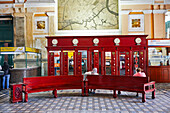 Traditional telephone booths inside Central Post Office in Ho Chi Minh City, Vietnam.