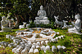 Sculptural group depicts people and animals heeding to Buddha. The Marble Mountains, Da Nang, Vietnam.