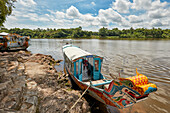 Moored dragon boats on the Perfume River. Hue, Vietnam.