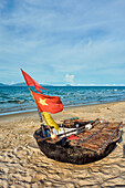 Traditional Vietnamese coracle on Cua Dai Beach. Hoi An, Quang Nam Province, Vietnam.