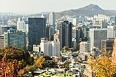  View of Seoul skyline in autumn from Namsan Mountrain Park, South Korea. 