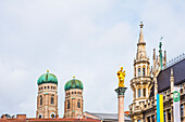  Munich, Marienplatz with town hall facade, Marian column and towers of the Frauenkirche, Bavaria, Germany 