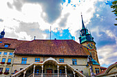 City Hall with Clock Tower and with Statue in a Sunny Summer Day in Old Town in Fribourg, Canton Fribourg, Switzerland.