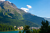 Panoramic View over City and Lake in Mountain Valley with Blue Sky and Clouds in a Sunny Summer Day in St. Moritz, Grisons, Switzerland.