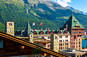 Beautiful Luxury Hotel with Blue Sky and Mountain in a Sunny Summer Day in St Moritz, Grisons, Switzerland.