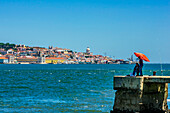  Views of Cacilhas is a town and a former municipality in the district of Almada on the southern bank of the Tagus, opposite the Portuguese capital Lisbon. 