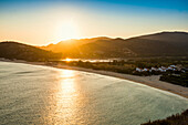  Beach and mountains, sunset, Spiaggia di Sa Colonia, Torre di Chia, Chia, south coast, Sardinia, Italy 