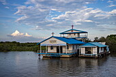  Catholic church on stilts in the water in the floating village on canal at Tonle Sap Lake, Chong Khnies, near Siem Reap, Siem Reap Province, Cambodia, Asia 