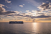  River cruise ship RV Mekong Discovery (Thurgau Travel) on Tonle Sap Lake at sunset, Chong Khneas, near Siem Reap, Siem Reap Province, Cambodia, Asia 