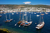 Elevated view of traditional Turkish gulets moored at sea. Bodrum, Mugla Province, Turkey.