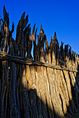  Wooden fence protecting Frans Indongo Lodge, Otjiwarongo, Otjozondjupa, Namibia, Africa 