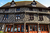 Half-timbered house (15th and 16th century), nicknamed "House of the Salmon" because a wooden salmon adorns its facade, now houses the tourist office, City of Chartres, Eure-et-Loir department, Centre-Val-de-Loire region, France, Europe