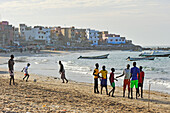 teenagers playing on the beach at Ngor village, Pointe des Almadies, Dakar,Senegal, West Africa