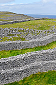 defensive concentric dry stone walls of Dun Aengus, prehistoric hill fort, Inishmore, the largest of the Aran Islands, Galway Bay, West Coast, Republic of Ireland, North-western Europe