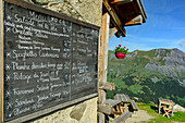  Board with menu at the Refuge de Trè la Tête, Tour du Mont Blanc, Mont Blanc Group, Graian Alps, Haute-Savoie, Upper Savoy, France 