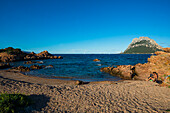  Picturesque beach and island, sunset, Isola di Tavolara, Porto San Paolo, Sardinia, Italy 