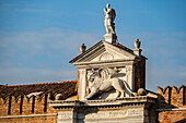 Porta Magna gate with lion at the Arsenale, Venice, Italy. The ancient monumental gate of the Venetian Arsenal was built in its current form around 1460 and is one of the earliest examples of Early Renaissance architecture in the lagoon.