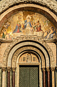 Main doorway into Saint Mark's Basilica, San Marco, Saint Mark's Square, Venice, Italy.