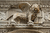 Venetian lion above the entrance of  Palazzo Ducale, Venice, Italy.