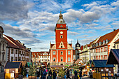  Christmas market on the main market with the old town hall in Gotha, Thuringia, Germany  