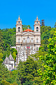 View of Bom Jesus do Monte santuary immersed in the greenery of the surrounding woods, Braga, Minho Province, Portugal