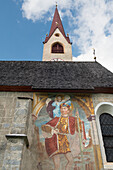 fresco depicting Saint Christopher on St James Church at Nessano / Nasen, Trentino-Alto Adige, Sudtyrol, South Tyrol, Italy, South-central Europe