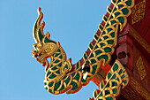 Close up of an ornate Naga finial in Wat Phrathat Doi Suthep, a highly revered Buddhist temple in Chiang Mai, Thailand.