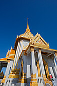 Exterior view of the Wat Traimit Temple on a bright sunny day. Bangkok, Thailand.