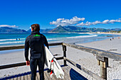  Surfers on the Atlantic beach Kommetjie, Cape Peninsula, South Africa, Africa 