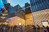 People walk in front of the Pavilion Shopping Mall, a premier shopping destination in Bukit Bintang district. Kuala Lumpur, Malaysia.