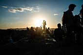 People on the Acropolis at sunset, Athens, Greece