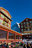 The Famous and Historical Hotel Bellevue des Alpes at 2061 Meters High Up and Mountain Peak of North Face of Eiger 3907 Meter High in a Sunny Winter Day in Kleine Scheidegg, Grindelwald, Canton Bern, Switzerland.