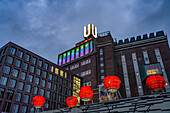  Illuminated sculptures Dortmund Roses in front of the Dortmund landmark U, Center for Art and Creativity at dusk, Dortmund, North Rhine-Westphalia, Germany, Europe 