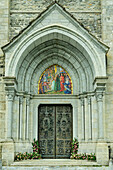  Entrance portal of the pilgrimage church Madonna del Sangue in Re, Re, Ticino Alps, Piedmont, Italy 