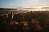  The Römerstein Tower surrounded by a misty autumn landscape, Römerstein municipality, Reutlingen district, Swabian Alb, Baden-Württemberg, Germany, Europe 