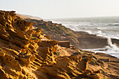 Fishermen's huts perched upon cliffs around Tamri on Atlantic Coast, between Agadir and Essaouira,Morocco,North Africa