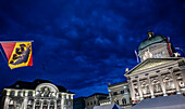 Beautiful Bundeshaus Illuminated Parliament Building or Federal Palace on Swiss National Bank in City Square Bundesplatz at Night in City of Bern, Bern Canton, Switzerland.