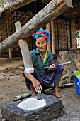 Foot activated lever pestle in the village of Ban Pha Yong, where live people from both Khmu and Hmong minority ethnics groups,  in mountain massif near Nong Khiaw, Luang Prabang Province, Laos, Southeast Asia