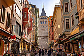 Shops, restaurants and the Galata Tower in Beyoğlu, Istanbul, Türkiye  