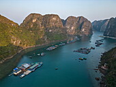  Aerial view of the floating fishing village of Cua Van and karst islands, Ha Tu, Halong Bay, Ha Long, Quang Ninh, Vietnam, Asia 